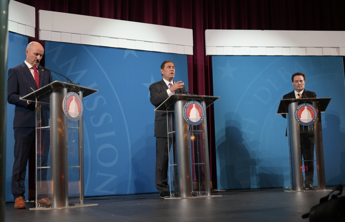 Utah Gov. Spencer Cox, Democratic challenger Brian King and Libertarian challenger J. Robert Latham debate at Salt Lake Community College on Sept. 11, 2024. (Photo Courtesy of The Globe Newspaper)